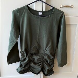 Forest green ruched top, labeled Medium but fits like a small.